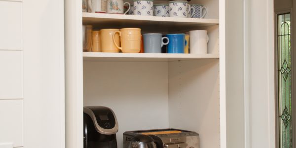 coffee-station-behind-cabinets